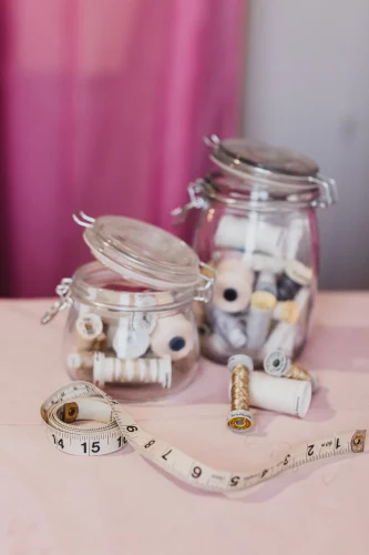 Jars of Cotton and Measuring Tape
